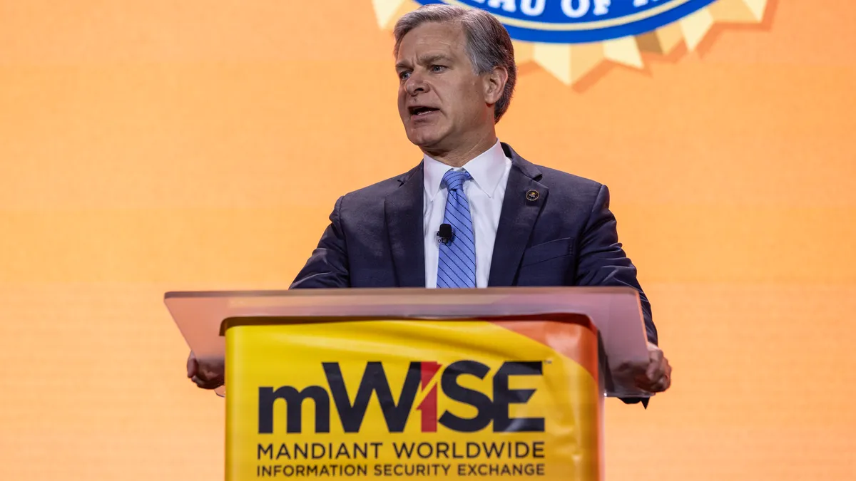FBI Director Chris Wray addresses the 2023 mWISE Conference from Mandiant.