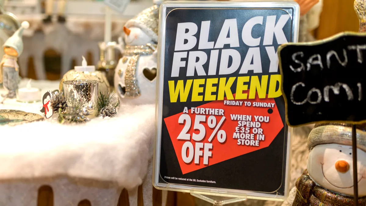Black Friday weekend 25% off discount banner in a boutique.
