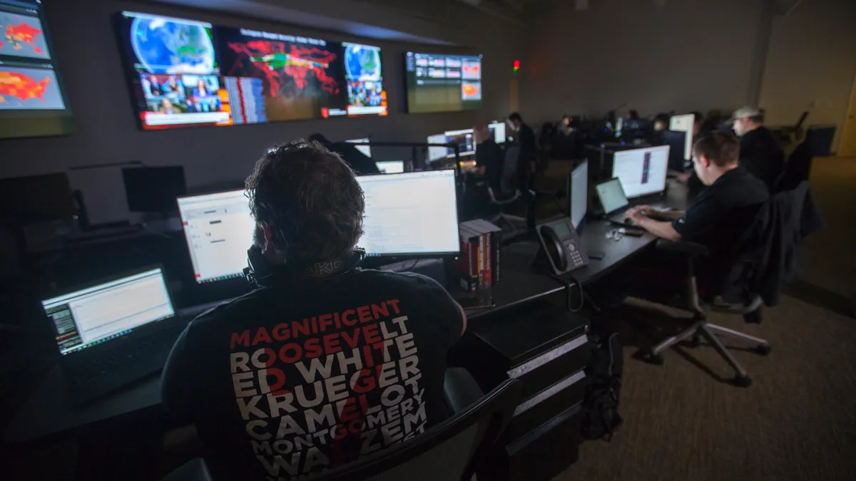 Workers at a security operations center at Rackspace.